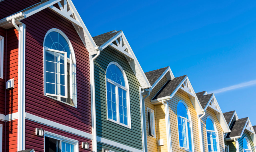Portland homes featuring trending siding colors like modern grays and natural greens